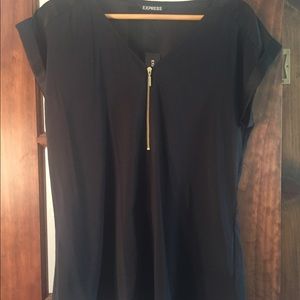 Black top with gold zipper. Tags on!